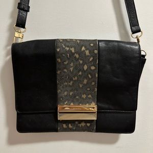 See by Chloe cross body with removable straps. Black leather, gold hard wear.